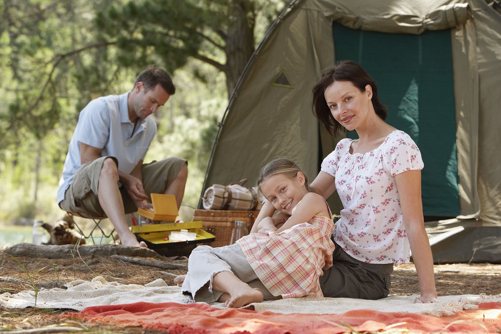 family of three on a camping trip