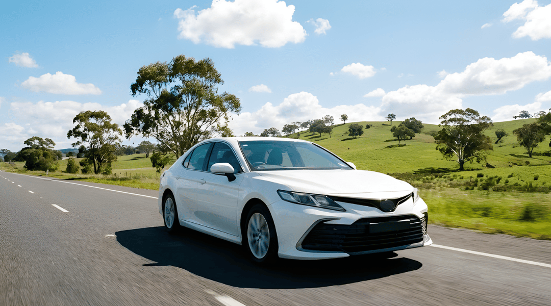 white rental car travelling the M1 from melbourne to sydney